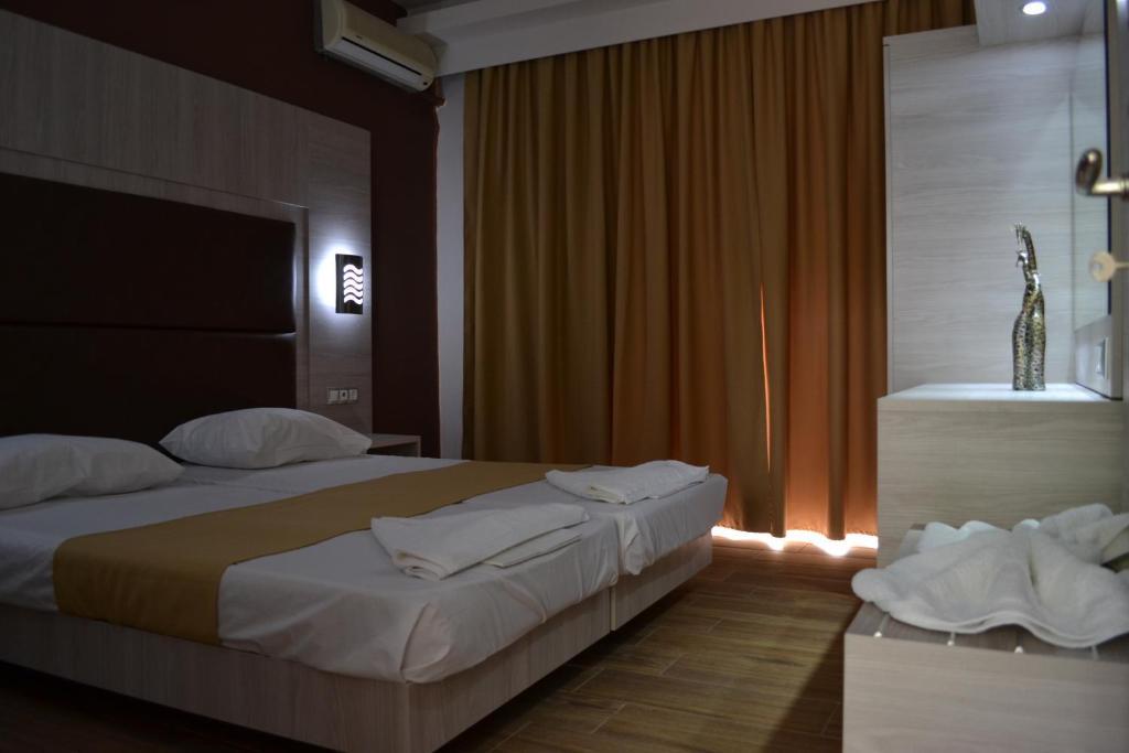 Karavos Hotel Apartments Архангелос Экстерьер фото