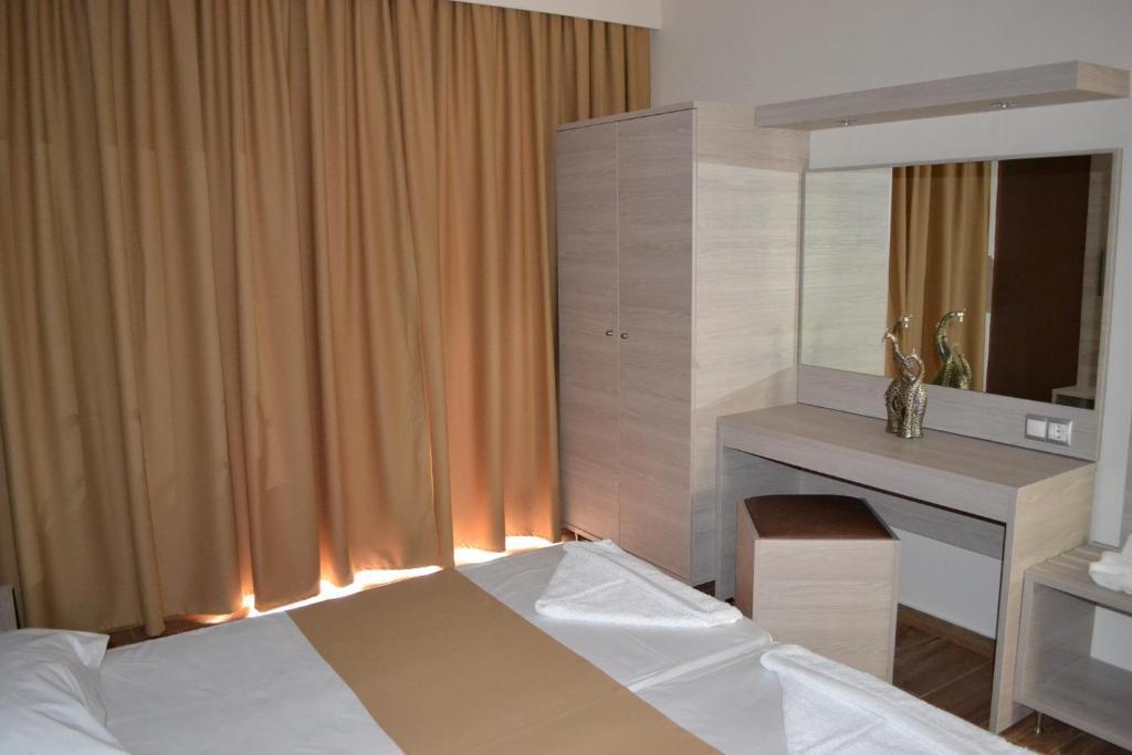 Karavos Hotel Apartments Архангелос Экстерьер фото