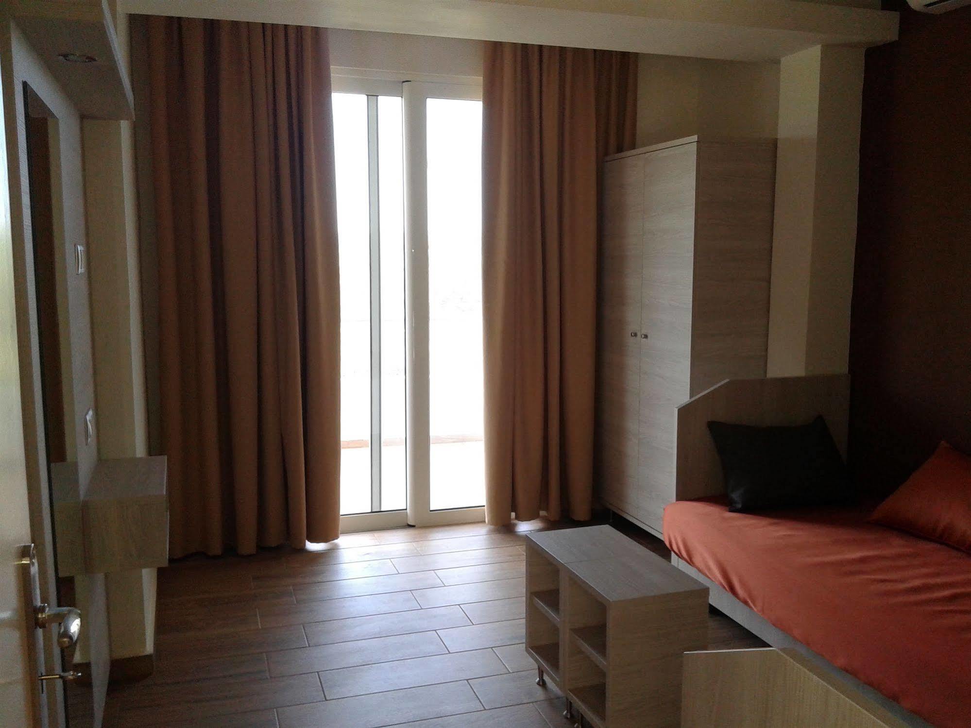 Karavos Hotel Apartments Архангелос Экстерьер фото