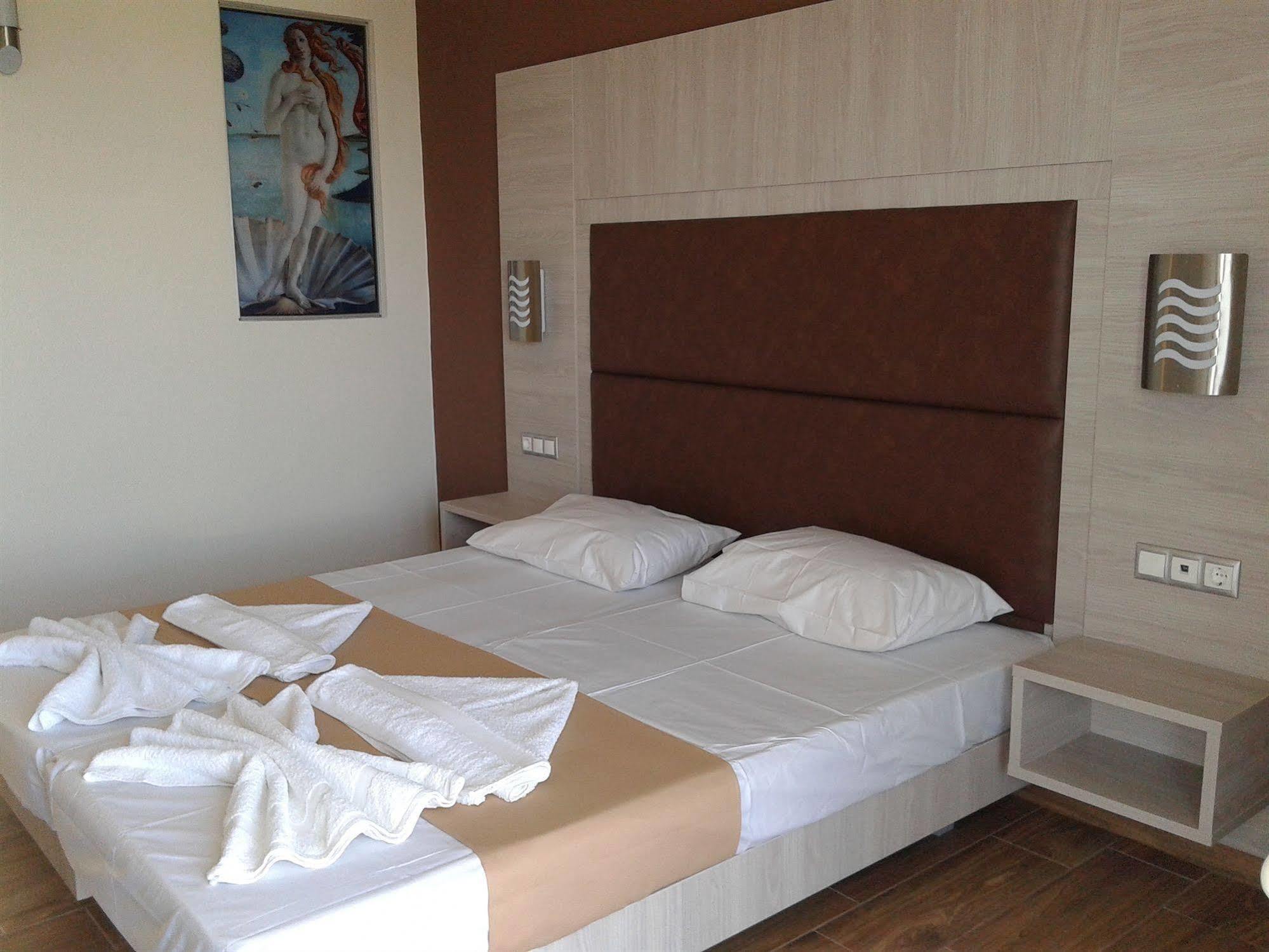 Karavos Hotel Apartments Архангелос Экстерьер фото